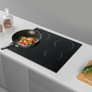 Fornello elettrico in ceramica nero, elegante e compatto, ideale per pentole e teiere  