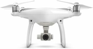 DJI Drone Phantom 4 con videocamera 12 MP/4K in volo, bianco, in un paesaggio mozzafiato