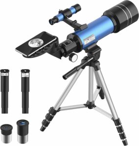 Telescopio portatile con treppiede sullo sfondo stellato