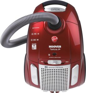 Hoover TE70_75 Traino con Sacco Telios Plus in colore rosso, con sacco da 3,5 litri e 700 watt di potenza, perfetto per pulizie silenziose ed efficienti.